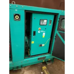 БУ дизельный генератор Cummins c55d5 в кожухе