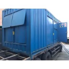 БУ дизельный генератор Cummins C900d5 в контейнере на шасси